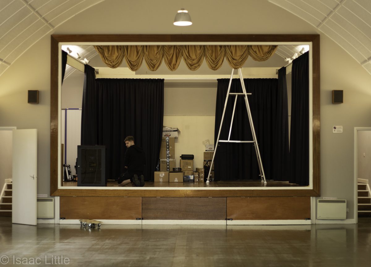 Southbourne Village Hall stage before installation, empty stage with old lighting